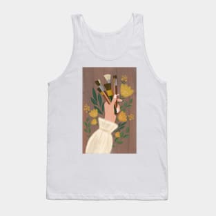 Woman's hand holding paint brushes surrounded by flowers Tank Top